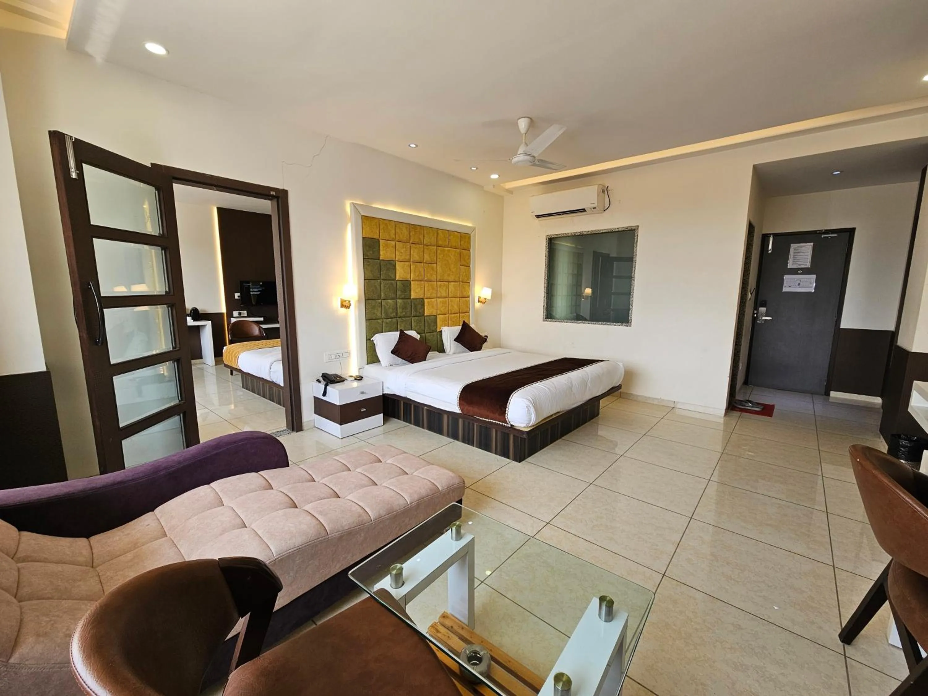 Photo of the whole room, Bed in Hotel Grand Darshan Vadodara