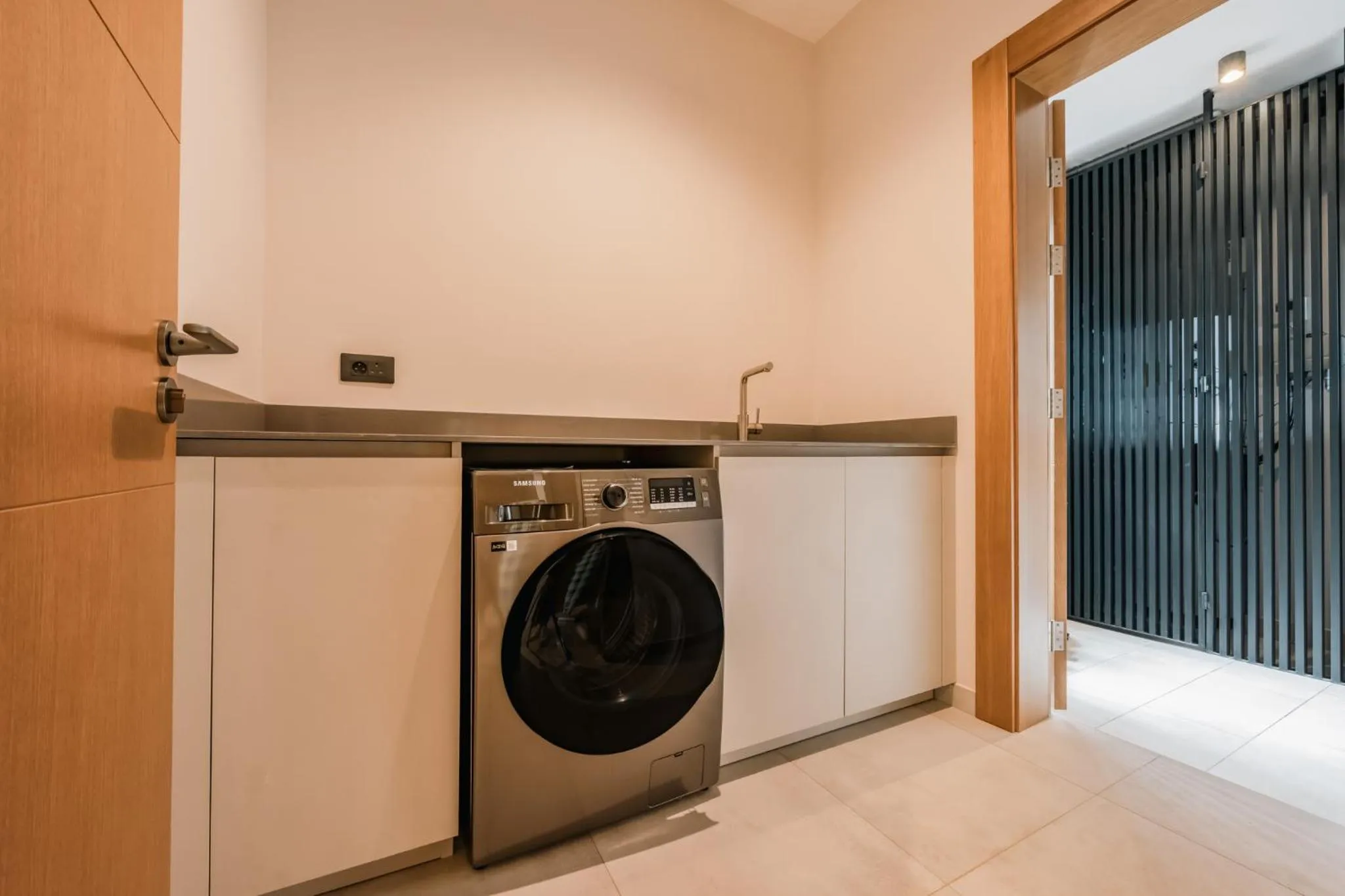 washing machine in Legend Hill Residences and Spa