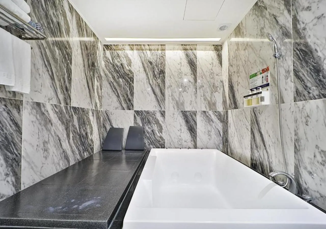 Bathroom, Bed in February Hotel Gimhae