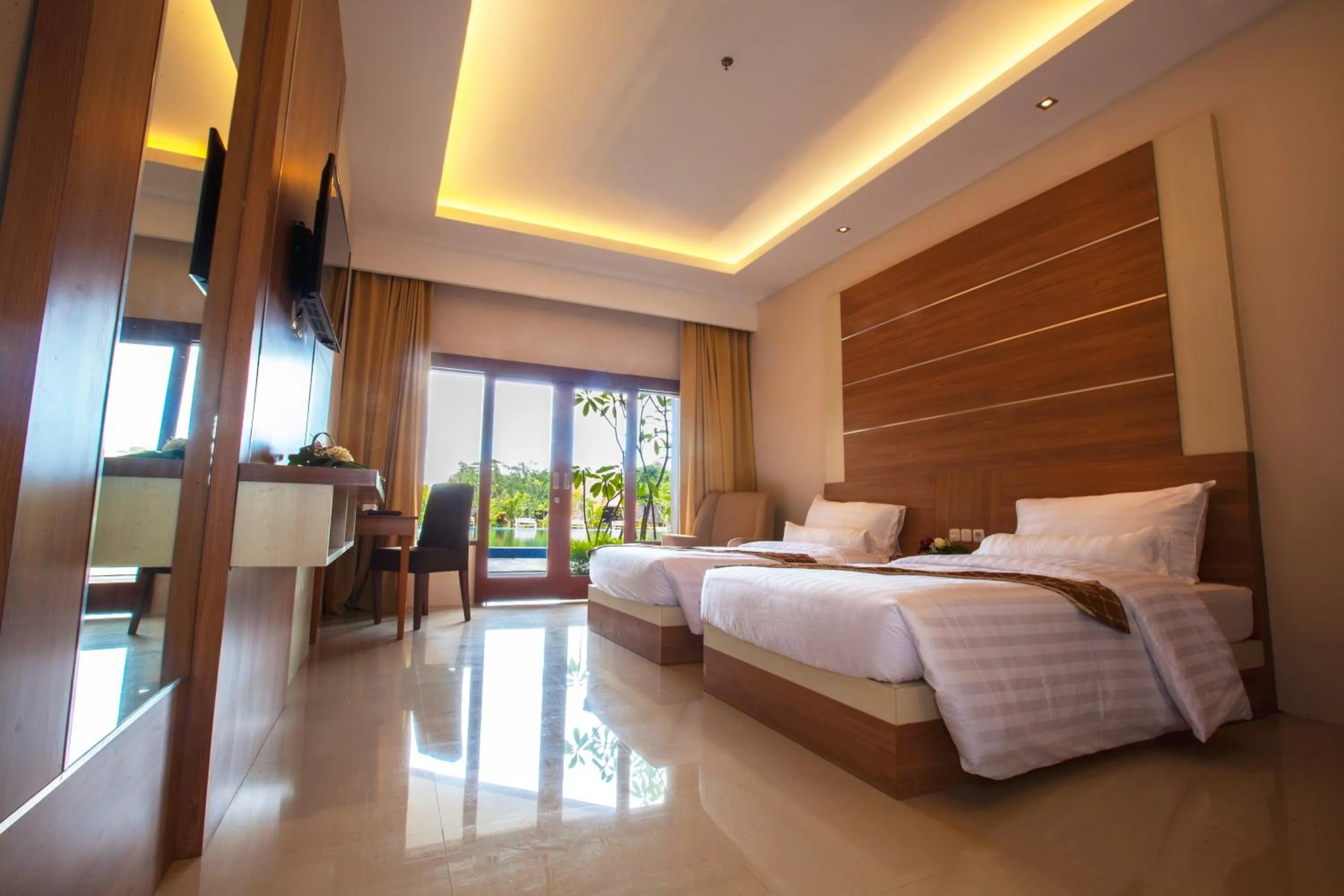 Bed in GRAND MULYA HOTEL BOGOR