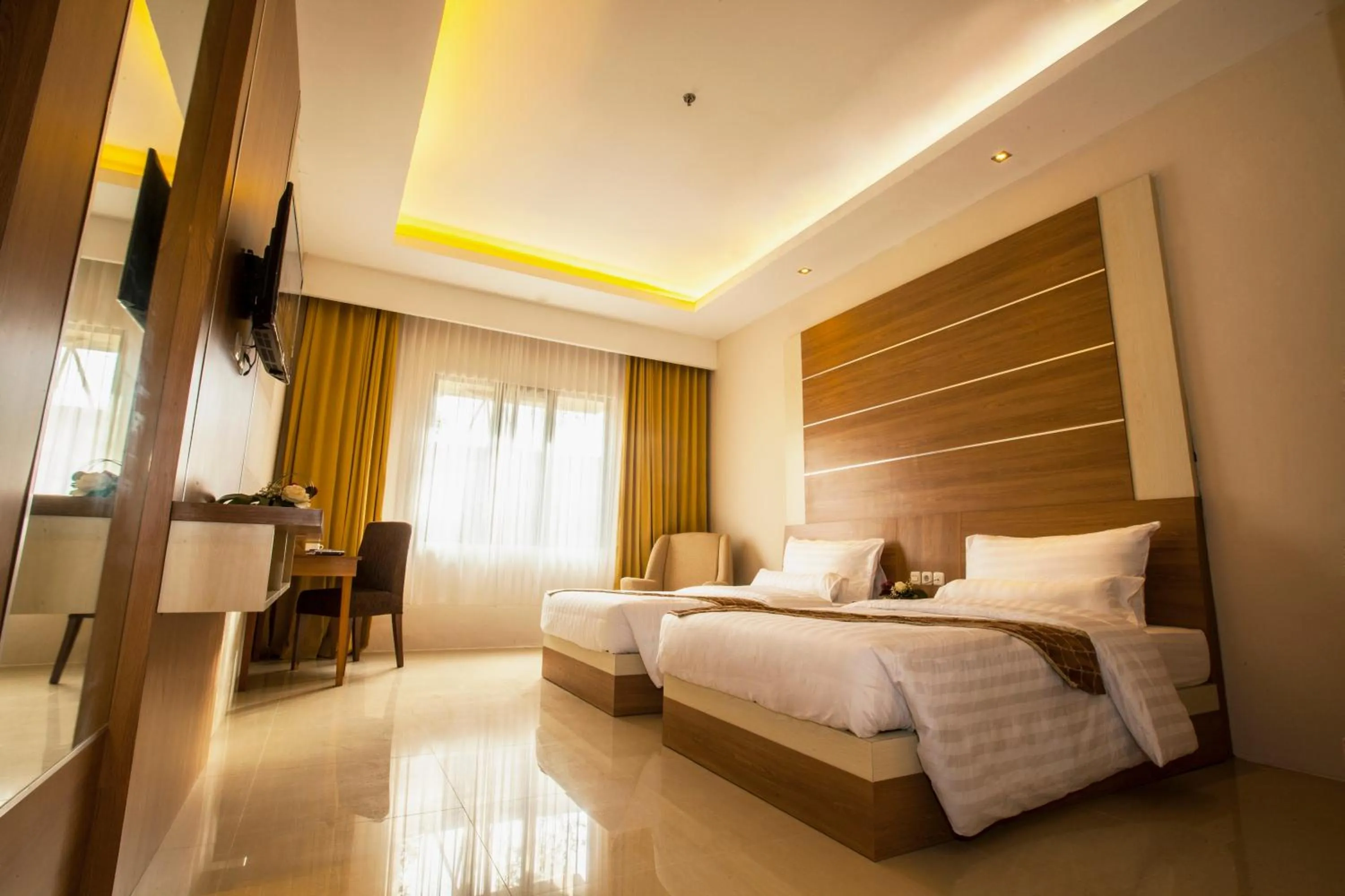 Bed in GRAND MULYA HOTEL BOGOR