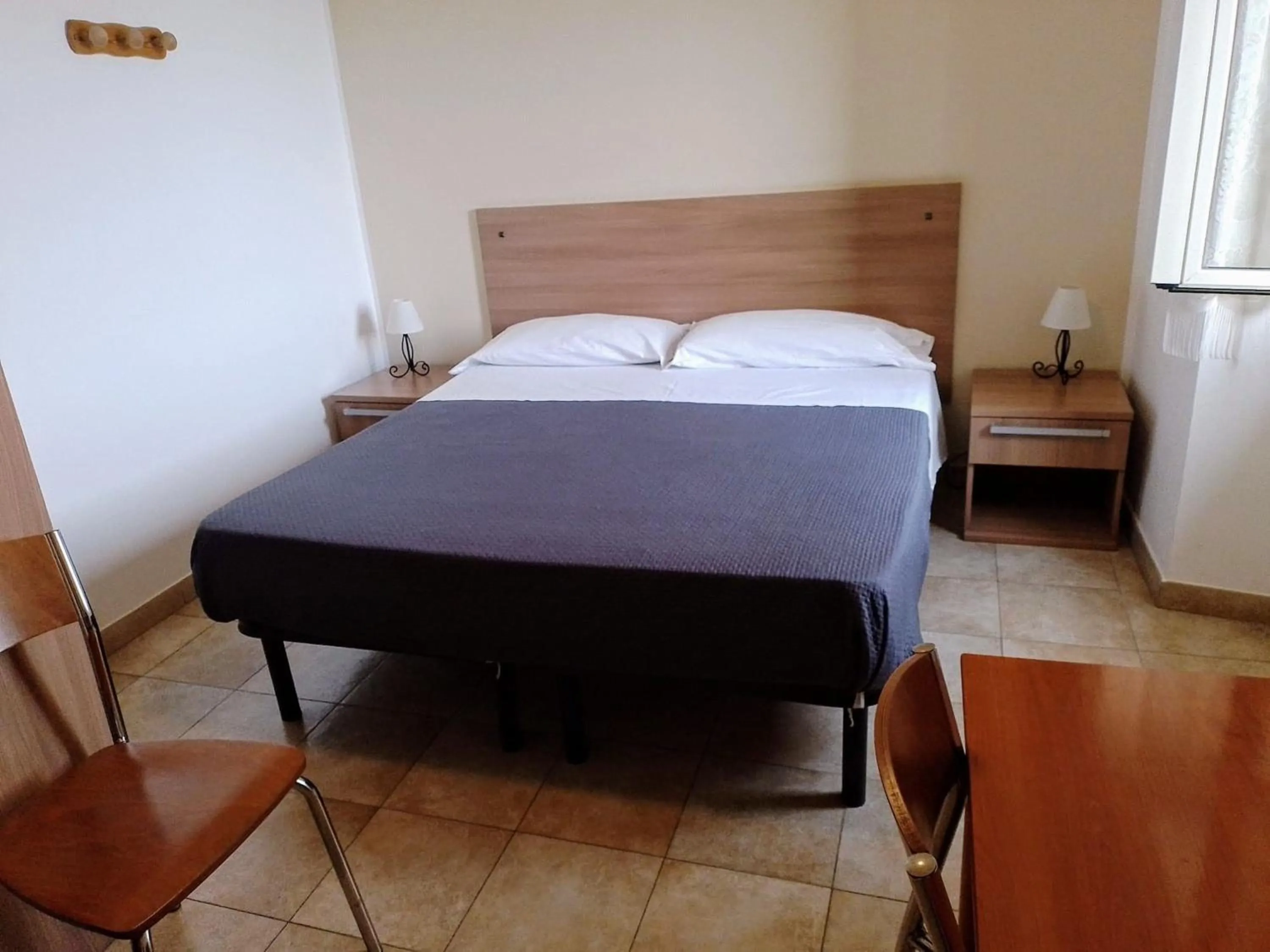 Bed in Hotel Pensione Cundari