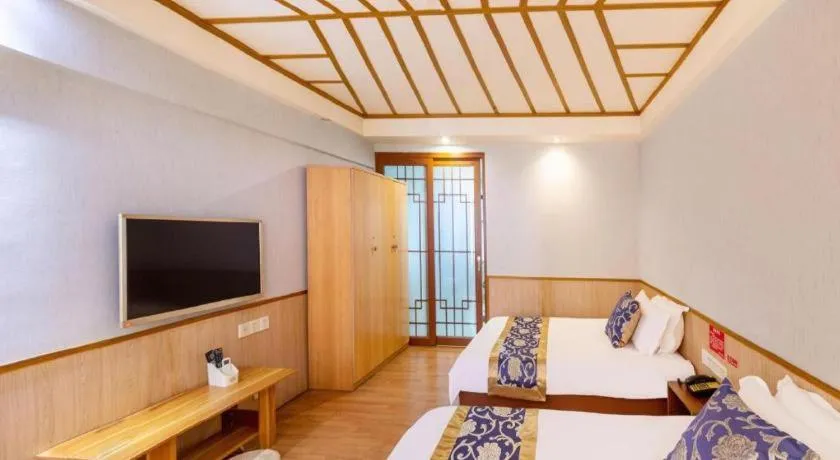 Bed in Yue Lai Yue Hotel