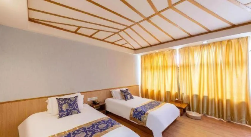 Bed in Yue Lai Yue Hotel