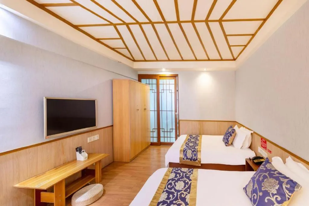 Bed in Yue Lai Yue Hotel