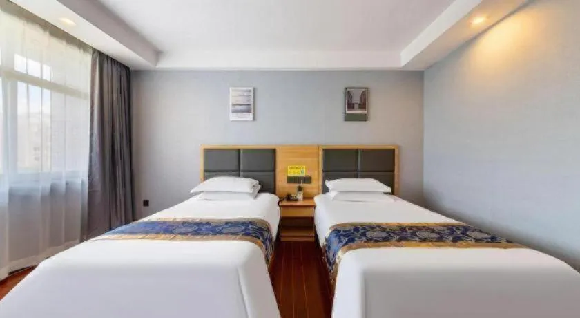 Bed in Yue Lai Yue Hotel