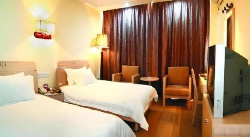 Bed in Yue Lai Yue Hotel