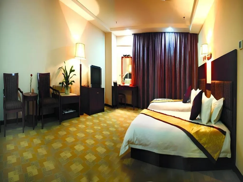 Bed in Yue Lai Yue Hotel