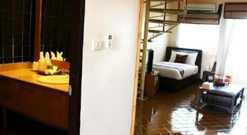 Bed in Gerard Habitat Hotel