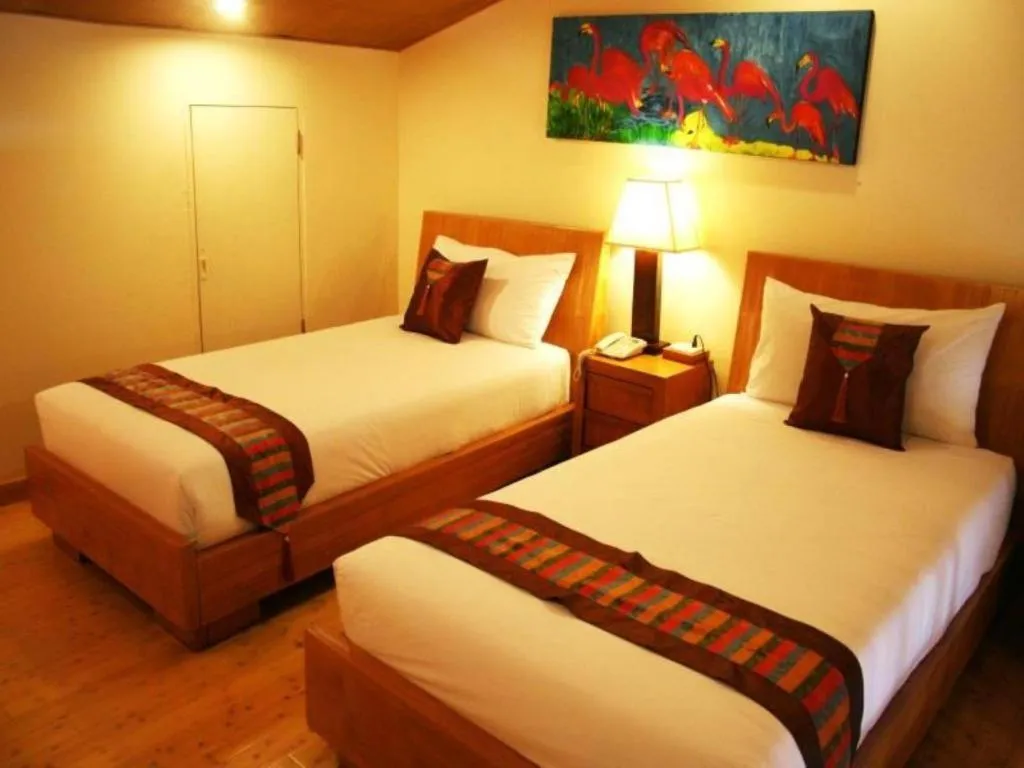 Bed in Gerard Habitat Hotel