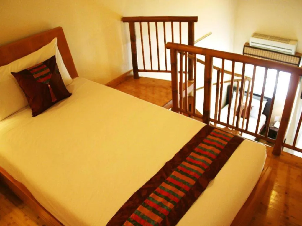 Bed in Gerard Habitat Hotel