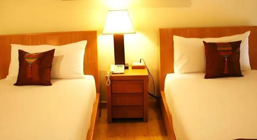 Bed in Gerard Habitat Hotel