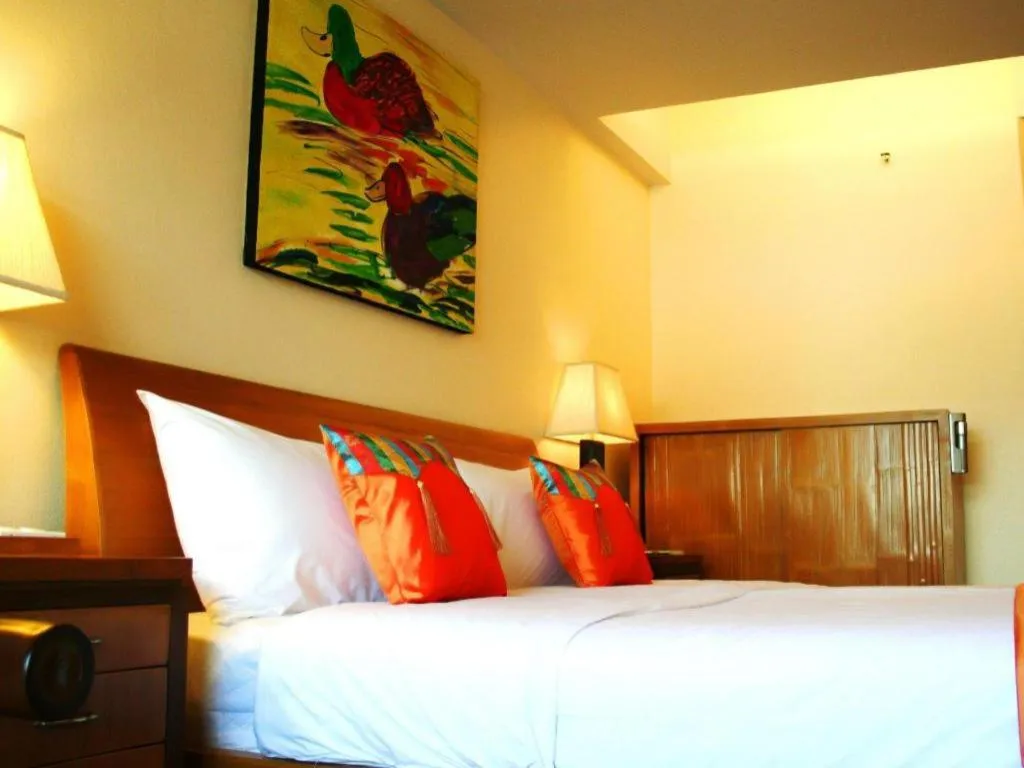 Bed in Gerard Habitat Hotel