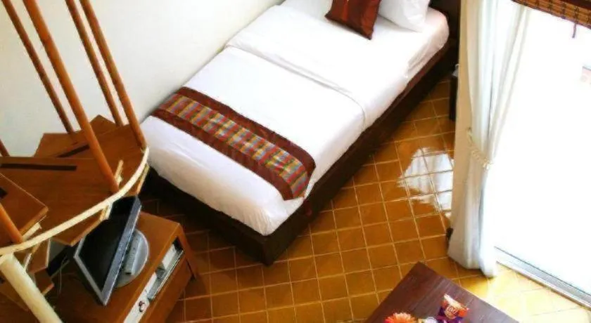 Bed in Gerard Habitat Hotel