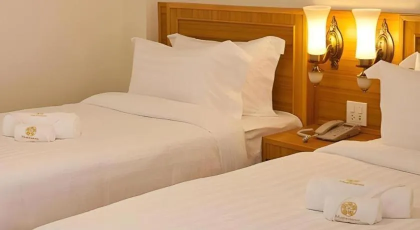 Bed in Muanmanee Boutique Hotel