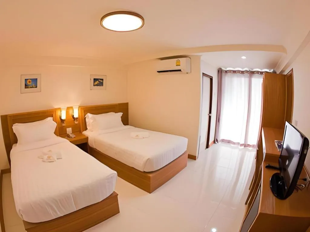 Bed in Muanmanee Boutique Hotel