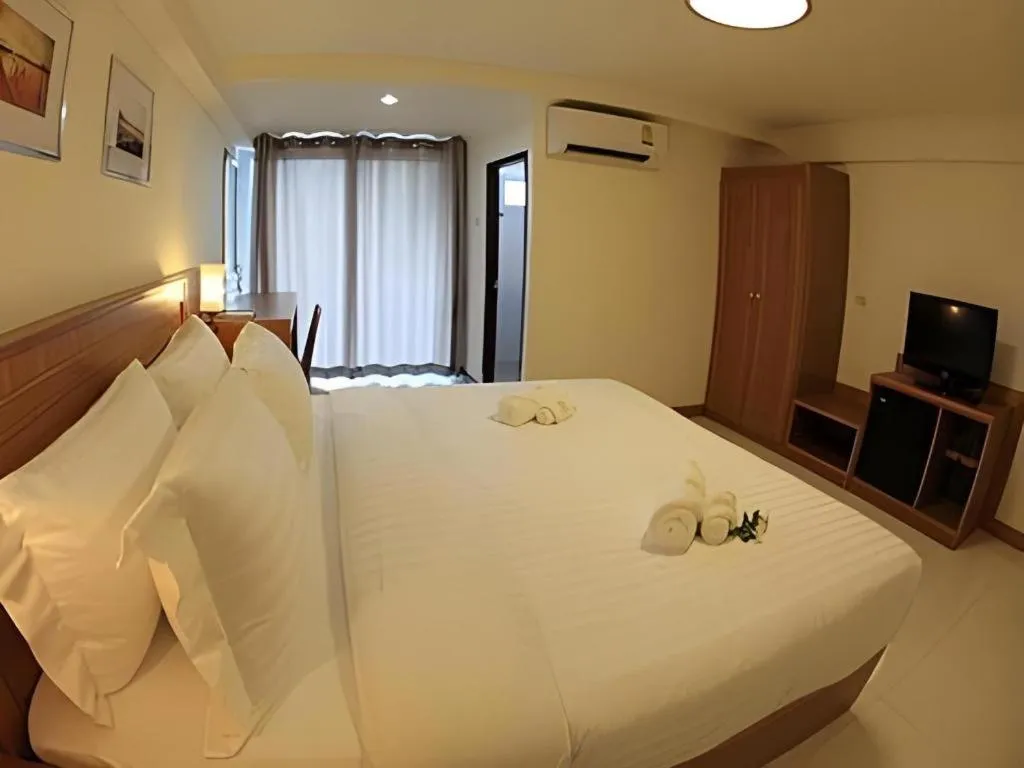 Bed in Muanmanee Boutique Hotel