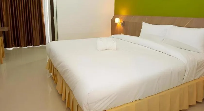 Bed in Soontree House Hotel