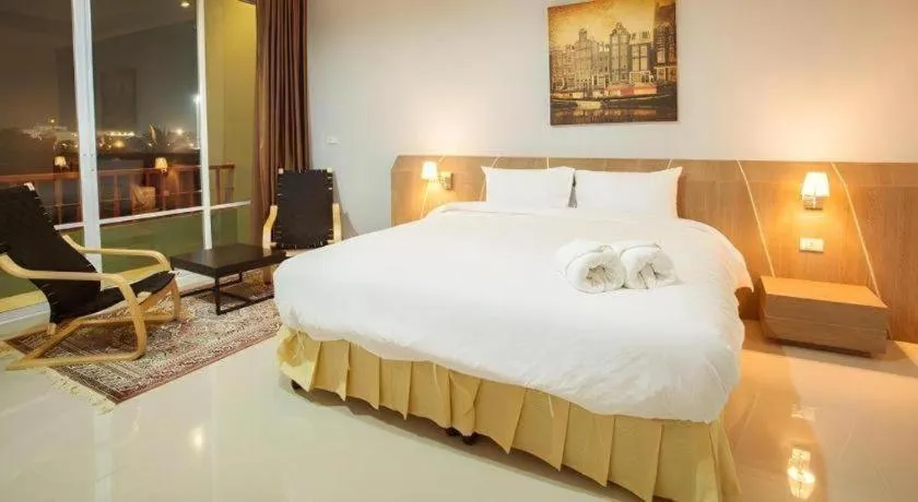 Bed in Soontree House Hotel