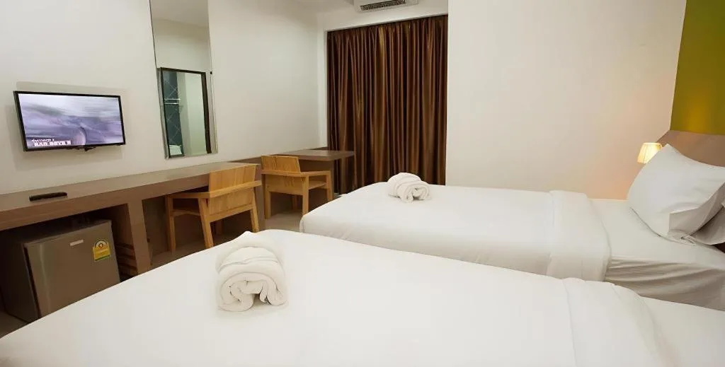 Bed in Soontree House Hotel