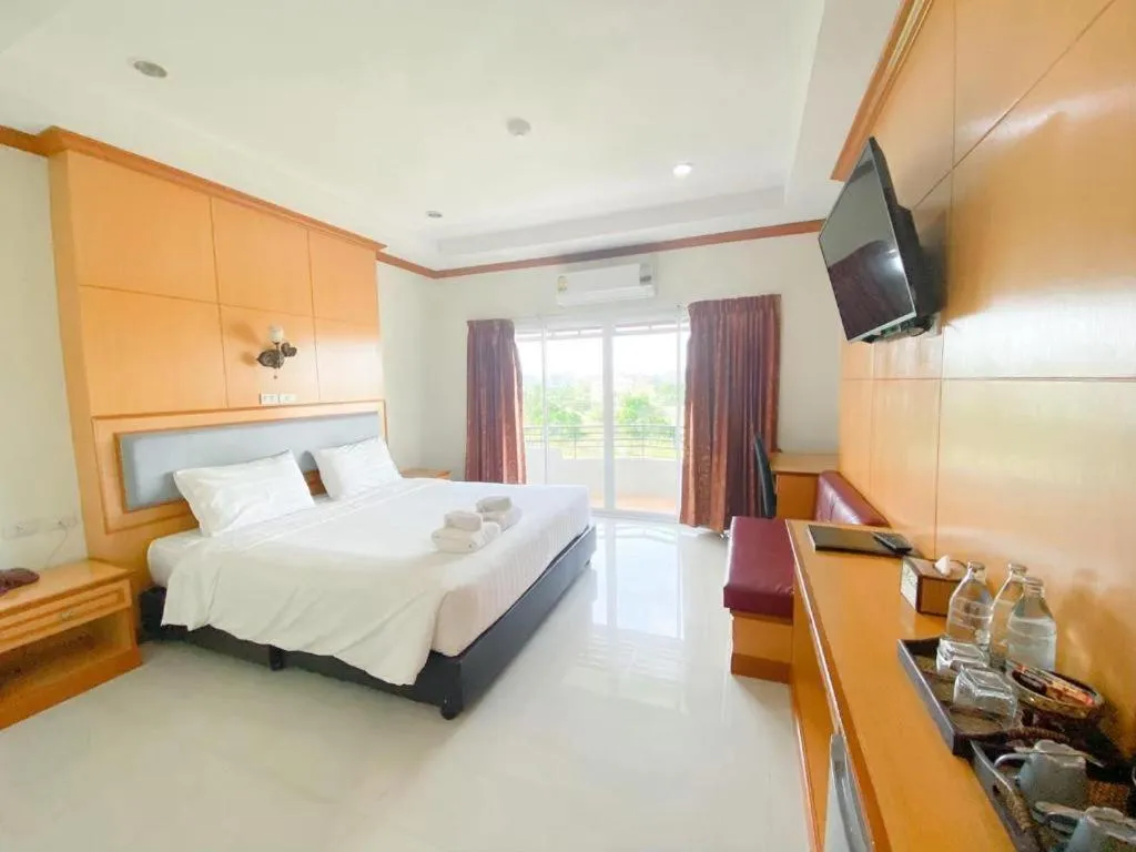 Bed in Siamtara Palace Hotel