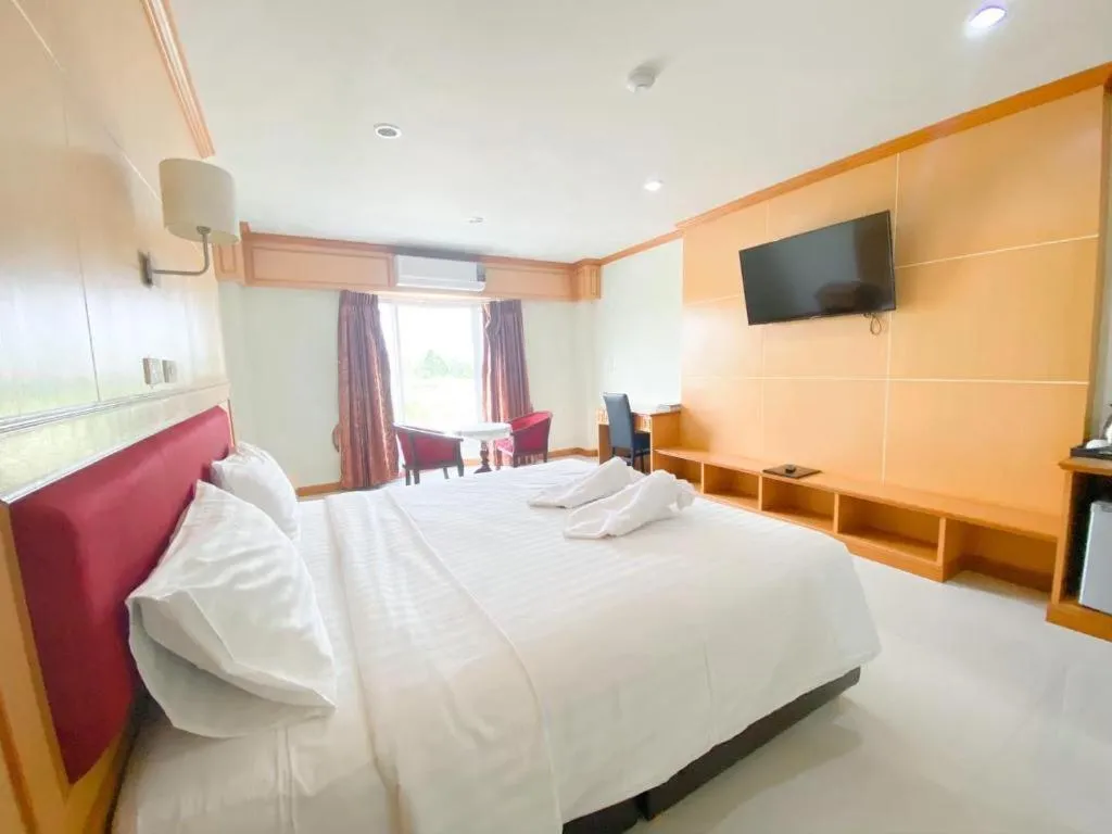 Bed in Siamtara Palace Hotel