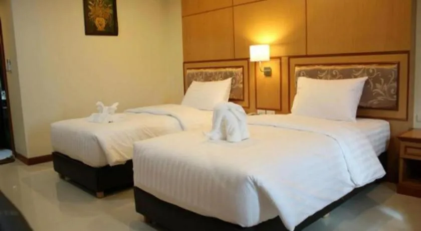 Bed in Siamtara Palace Hotel