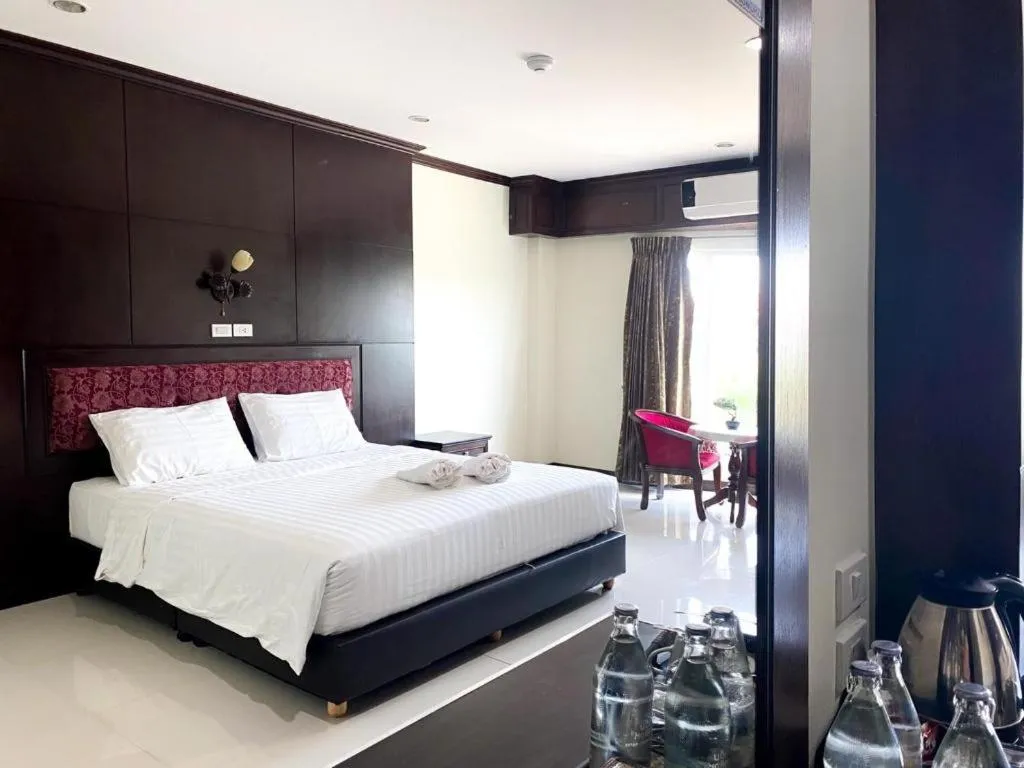 Bed in Siamtara Palace Hotel