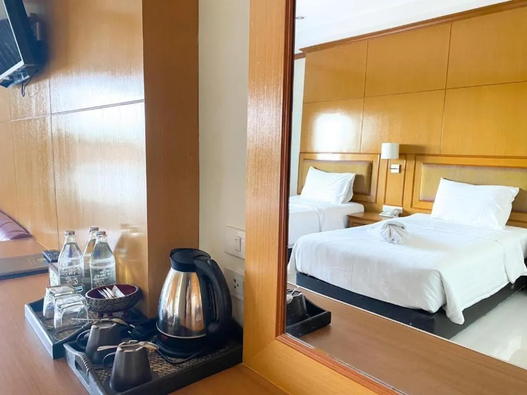 Bed in Siamtara Palace Hotel