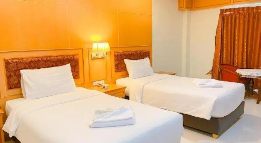 Bed in Siamtara Palace Hotel