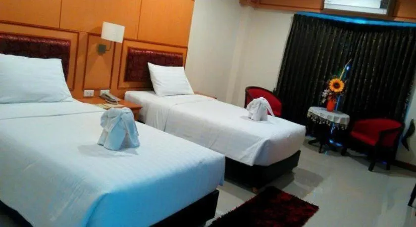 Bed in Siamtara Palace Hotel