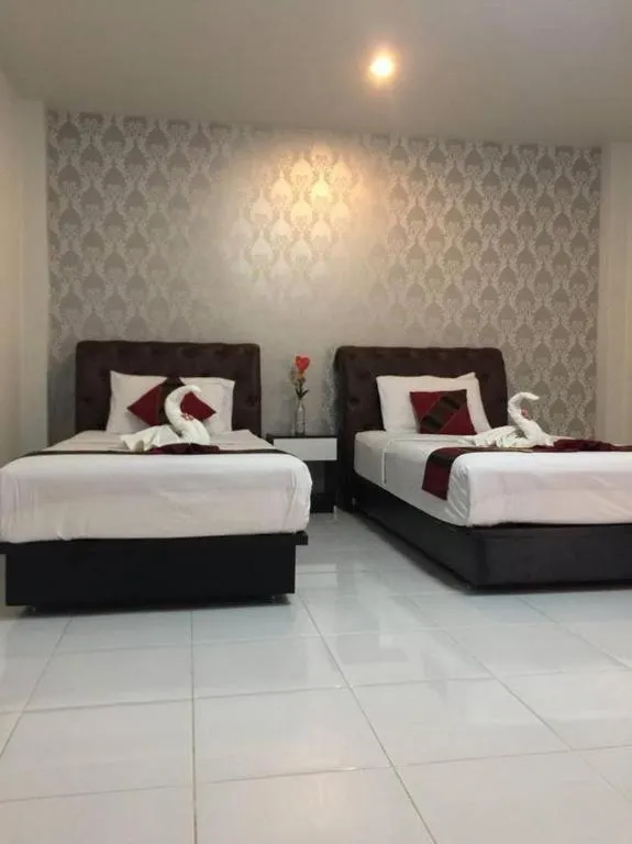 Bed in Nan Treasure Hotel