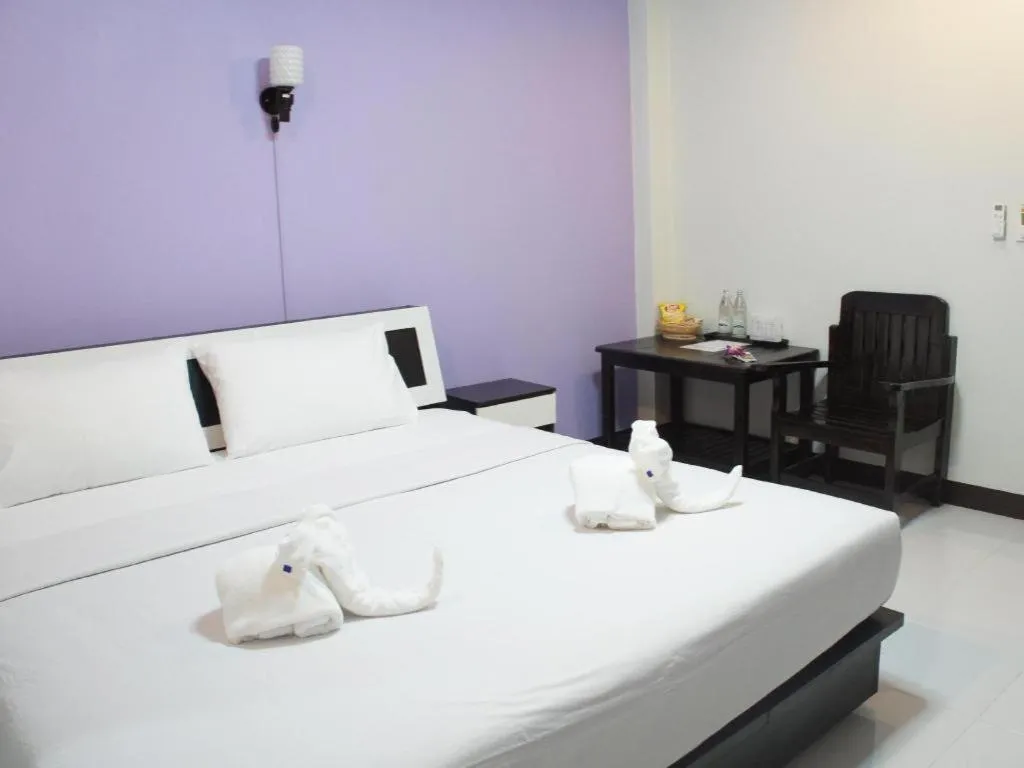 Bed in Nan Treasure Hotel