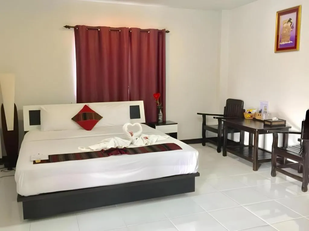 Bed in Nan Treasure Hotel