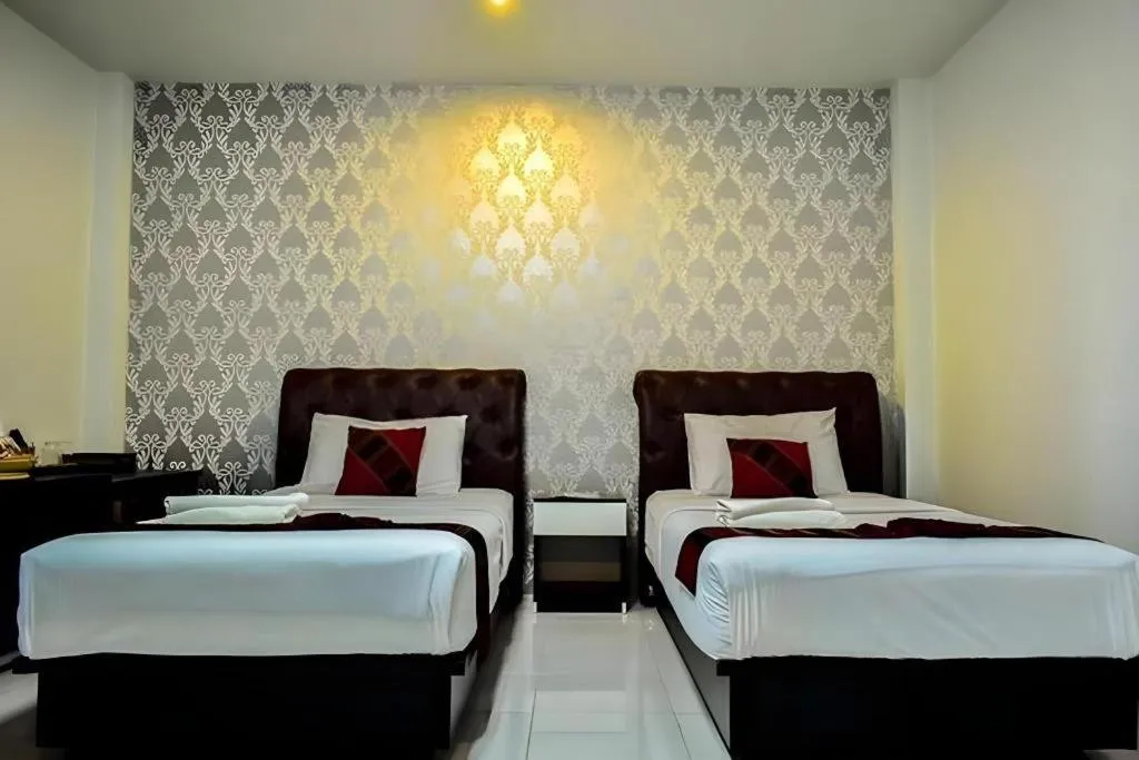 Bed in Nan Treasure Hotel