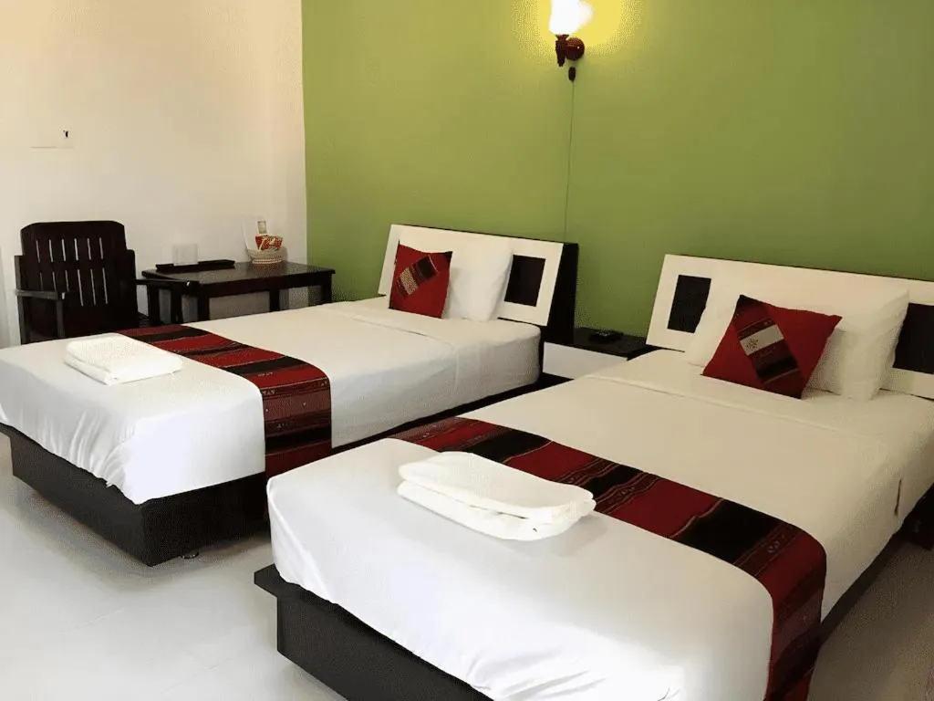 Bed in Nan Treasure Hotel