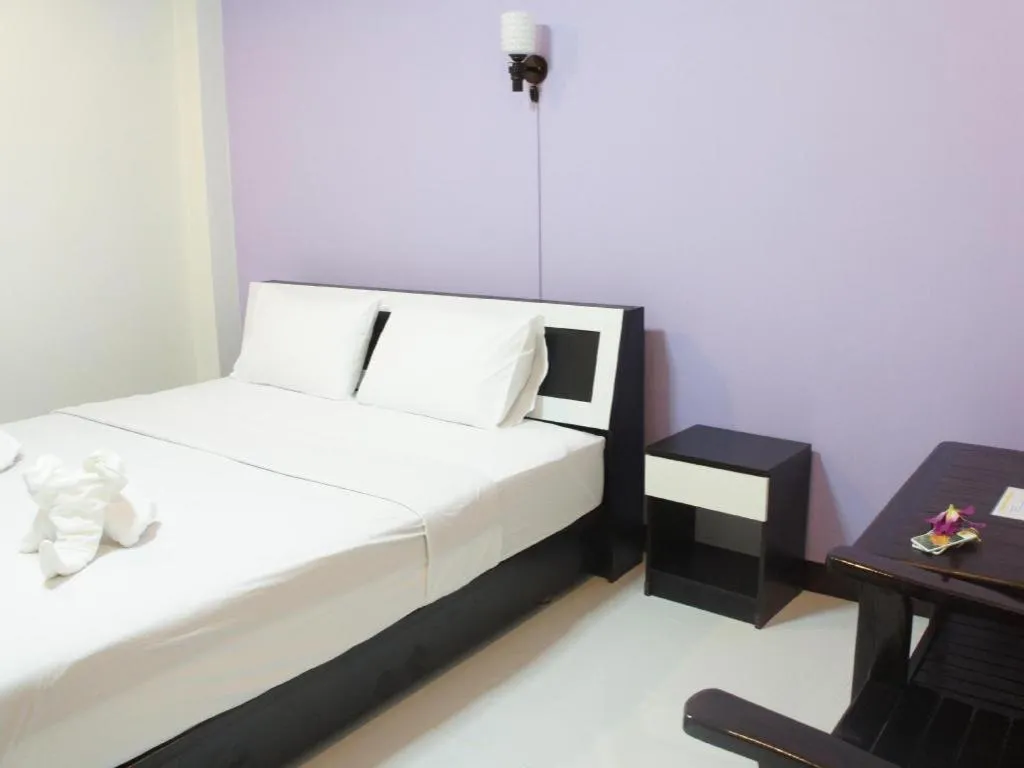 Bed in Nan Treasure Hotel