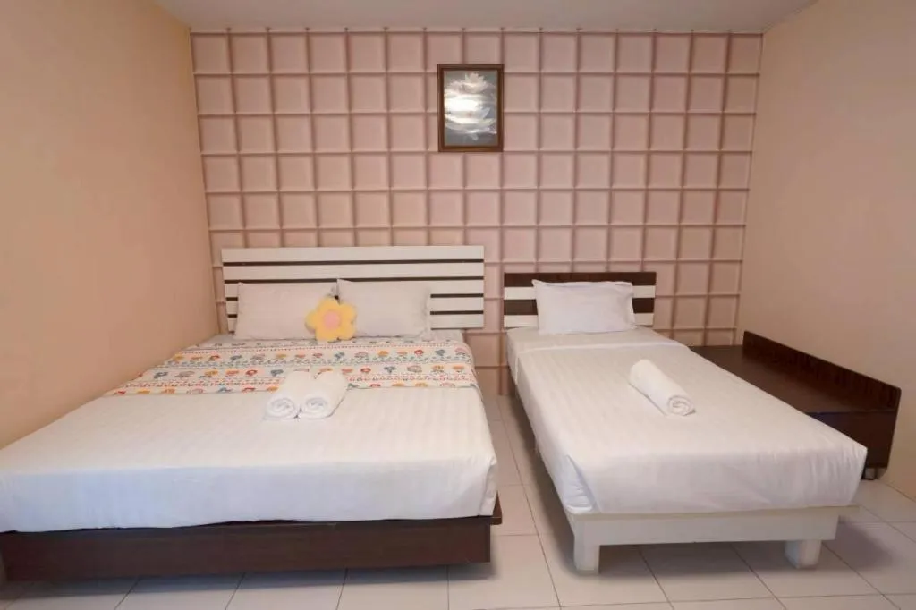 Bed in Nornnan Hotel