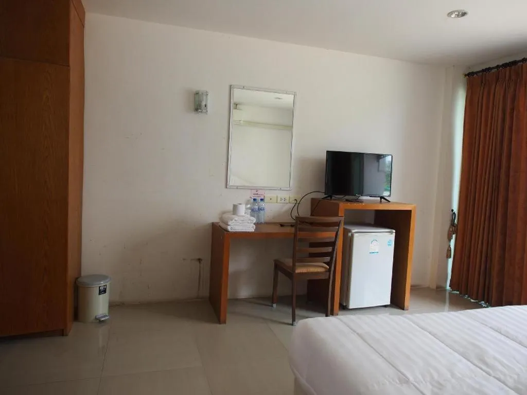 Bed in Phetsuwan Hotel