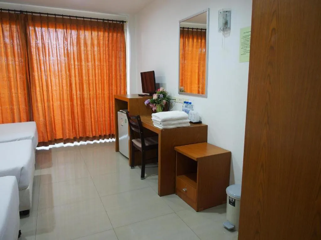 Bed in Phetsuwan Hotel