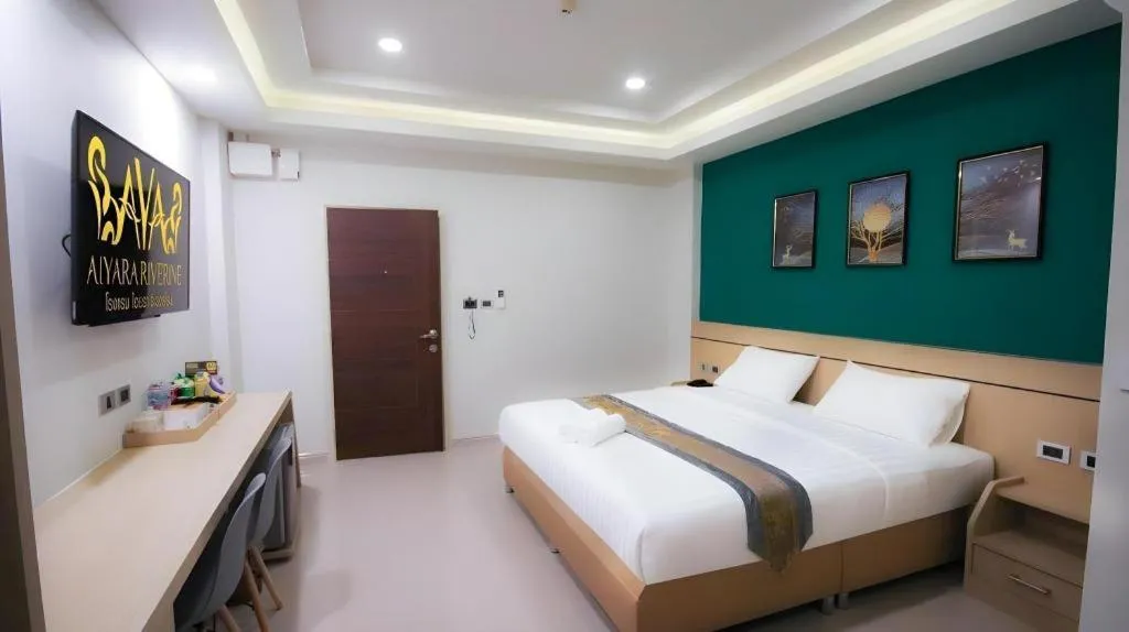 Bed in Aiyara Riverine Hotel, Nakhon Phanom