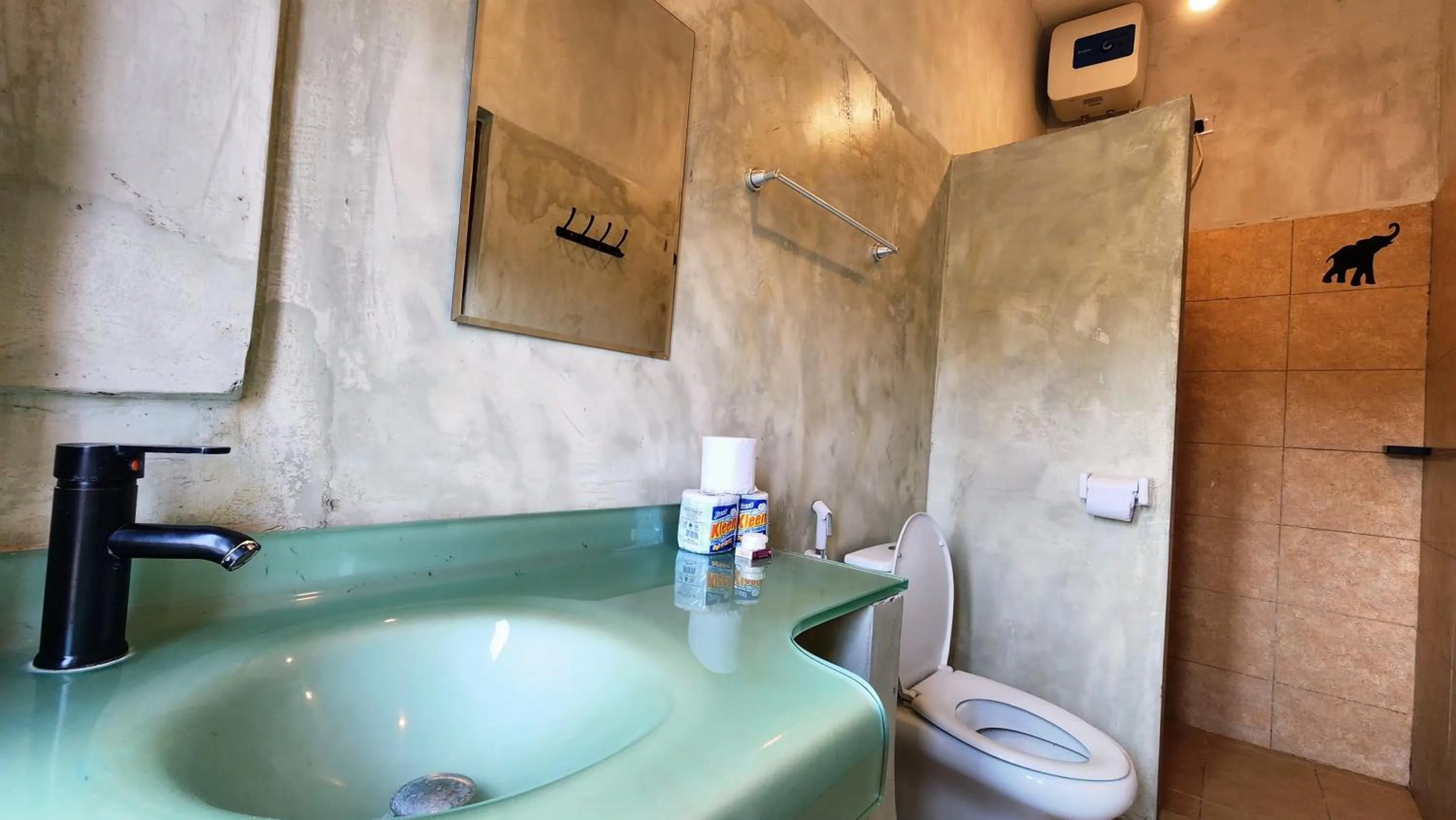 Bathroom in Rumaisa Hotel