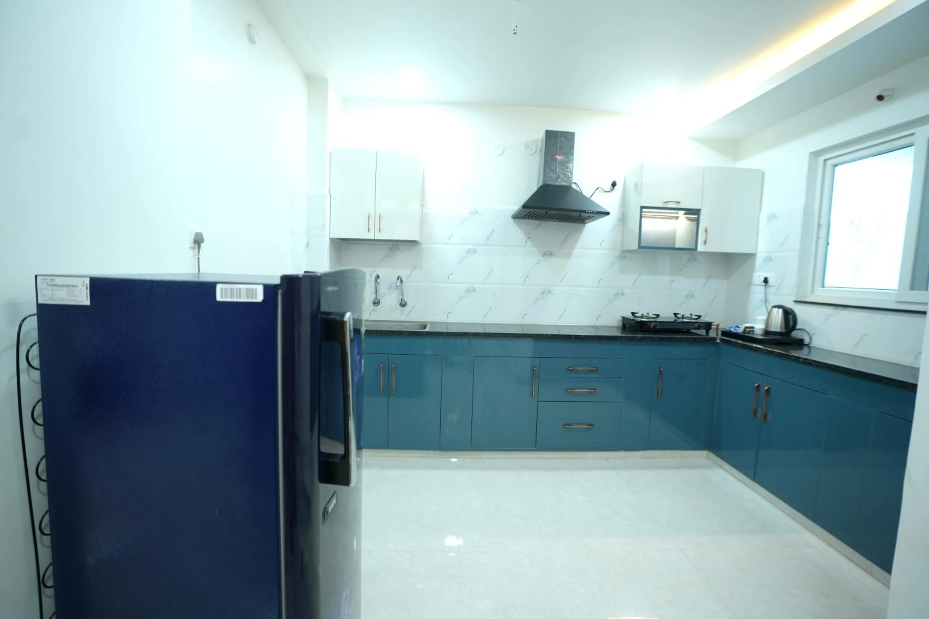 Kitchen or kitchenette in Hotel Viola Suites Madhapur, Business Hotel