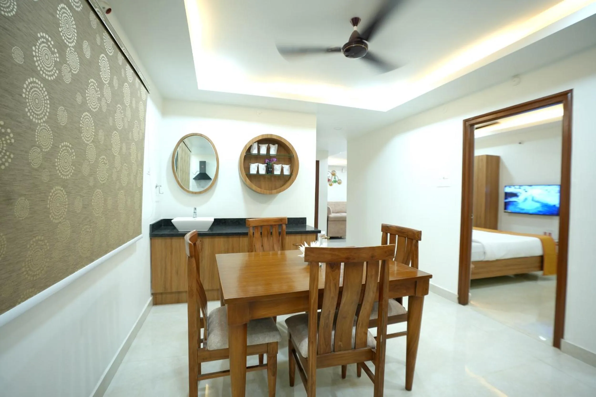 Dining area, Bed in Hotel Viola Suites Madhapur, Business Hotel