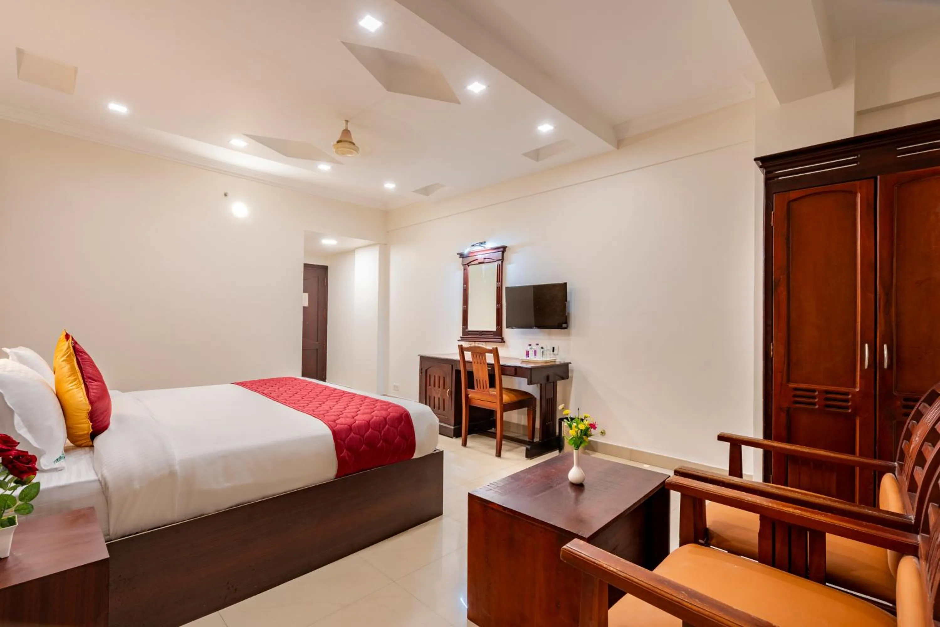 Seating area, Bed in Daan Orchid Residency