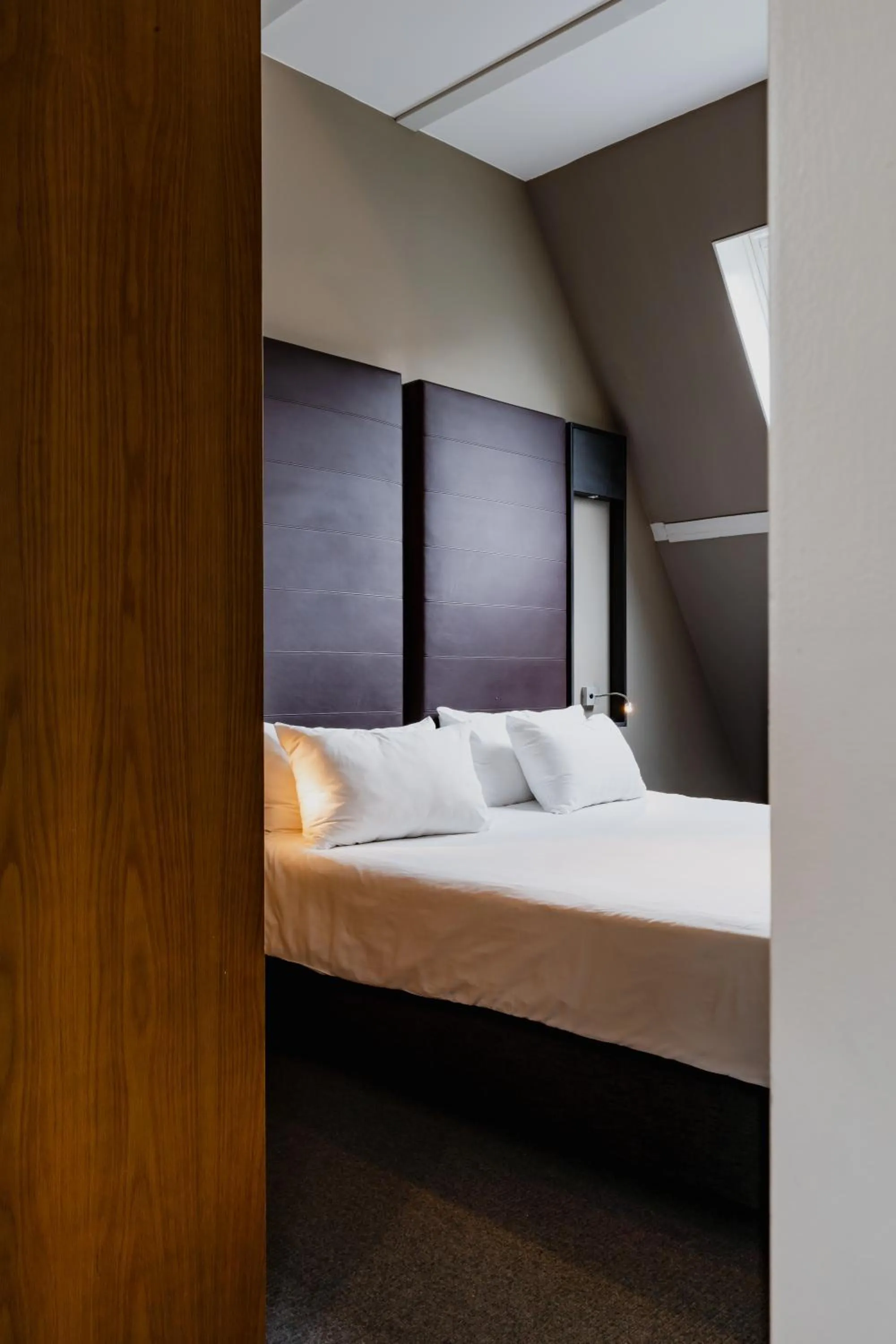 Bed in Apartments De Hallen