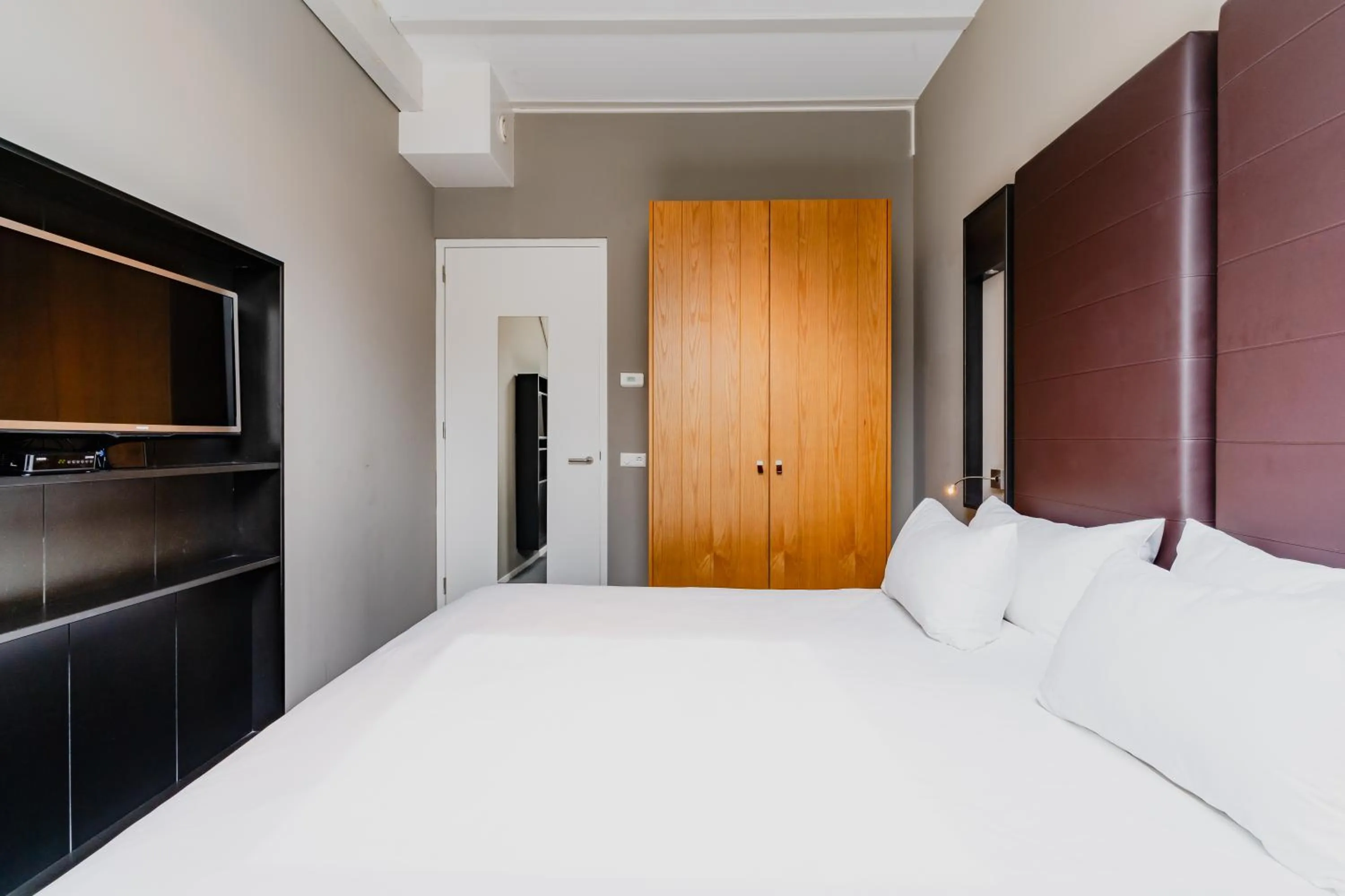 Bed in Apartments De Hallen