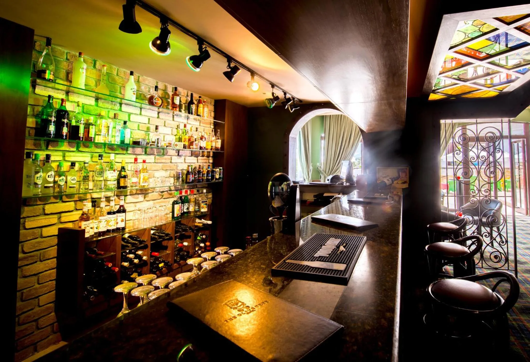 Lounge or bar in The Olive Tree Hotel