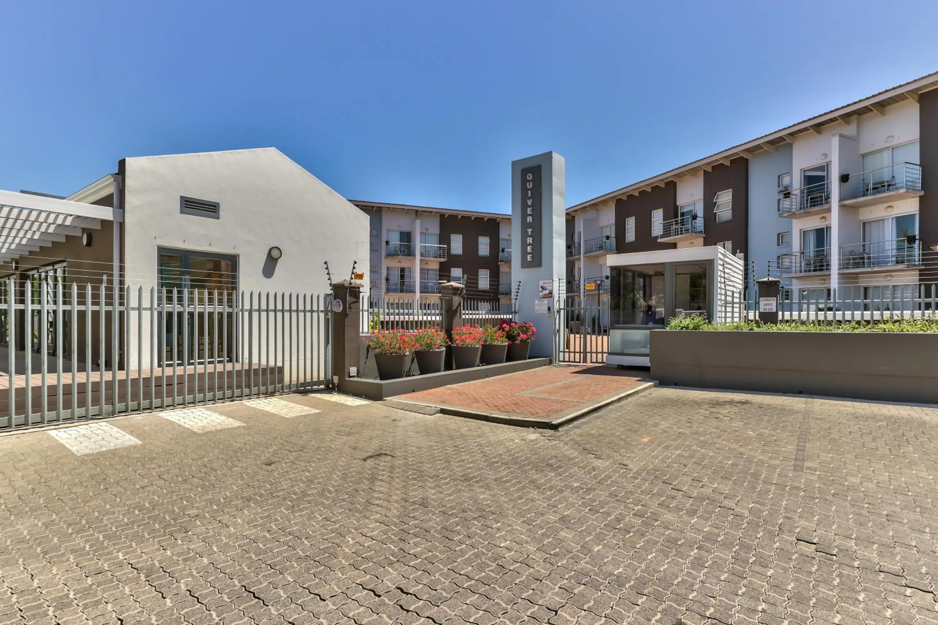 Property building in WINK Aparthotel Quiver Tree