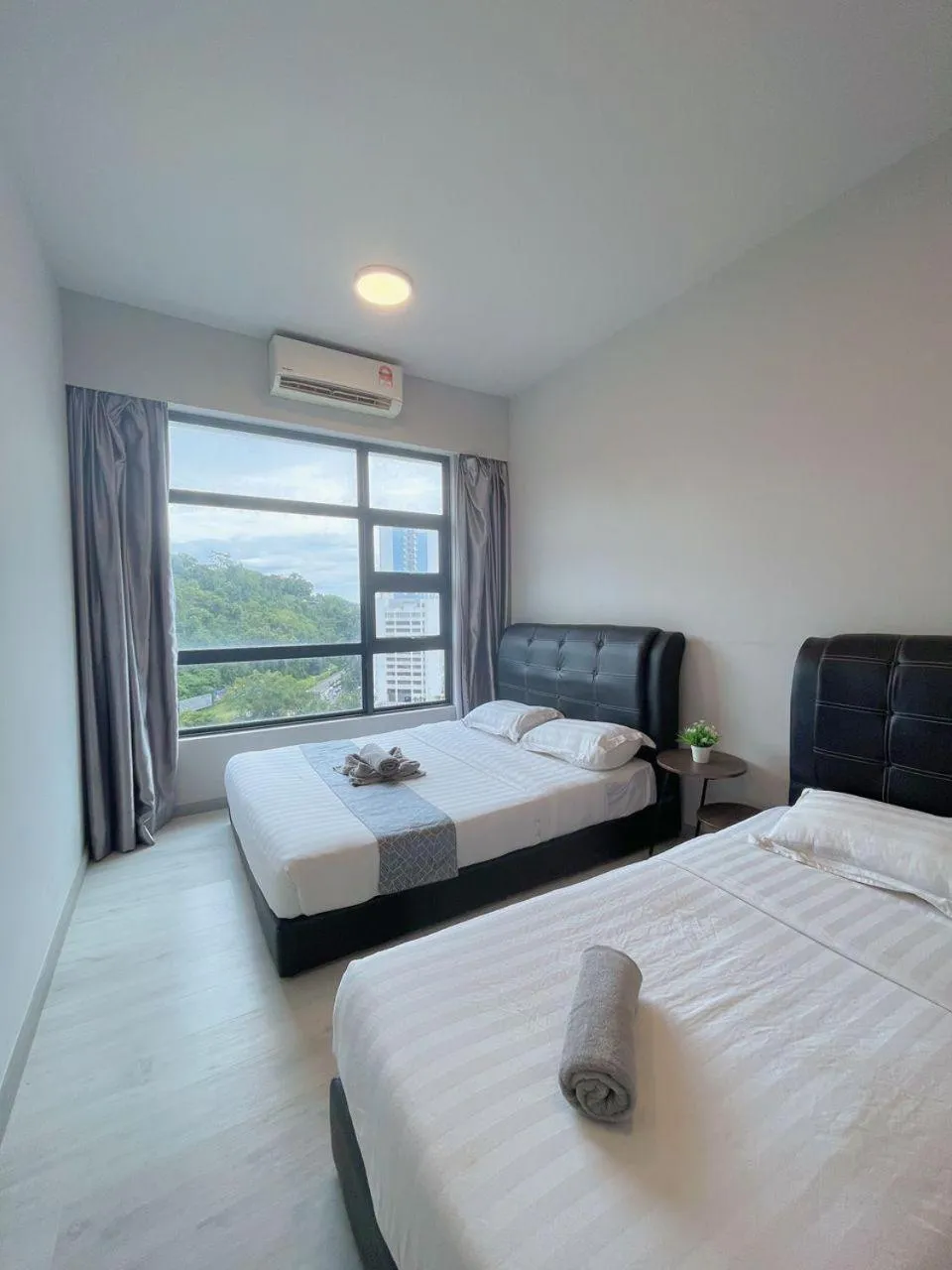 Bed in Jesselton Quay Kota Kinabalu City Centre by LW Suites